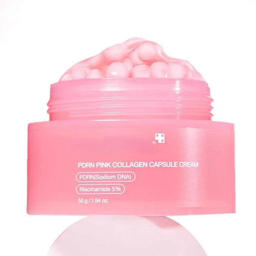 Crema viso Medicube PDRN Pink Collagen Capsule, con texture ricca e confezione con capsule di collagene rosa, ideale per la cura della pelle.